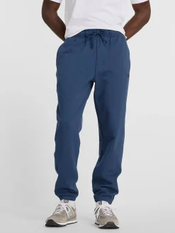 NEW BALANCE Pantaloni<PANTALONE JOGGER ATHLETICS FRENCH TERRY Blu, Nero