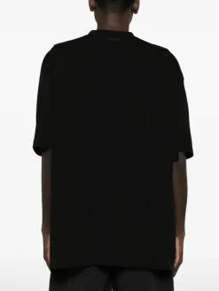 VETEMENTS. T-Shirt<T-SHIRT LIMITED EDITION LOGO Bianco, Nero